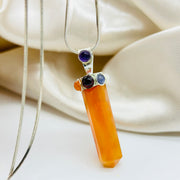 Carnelian Point With Cabochon Crystal Pendant