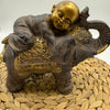 Monk on Elephant Statue (Right facing)