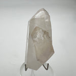 polished clear quartz with bridging crystal