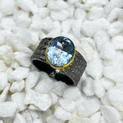 Blue Topaz Rhodium Plated Sterling Silver Ring