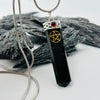 Black Tourmaline Pentacle Crystal Pendant Encased In White Metal