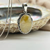 Sterling Silver Golden Rutile Quartz Crystal Cabochon Pendant with Edge-Detailing Sterling Silver Pendants
